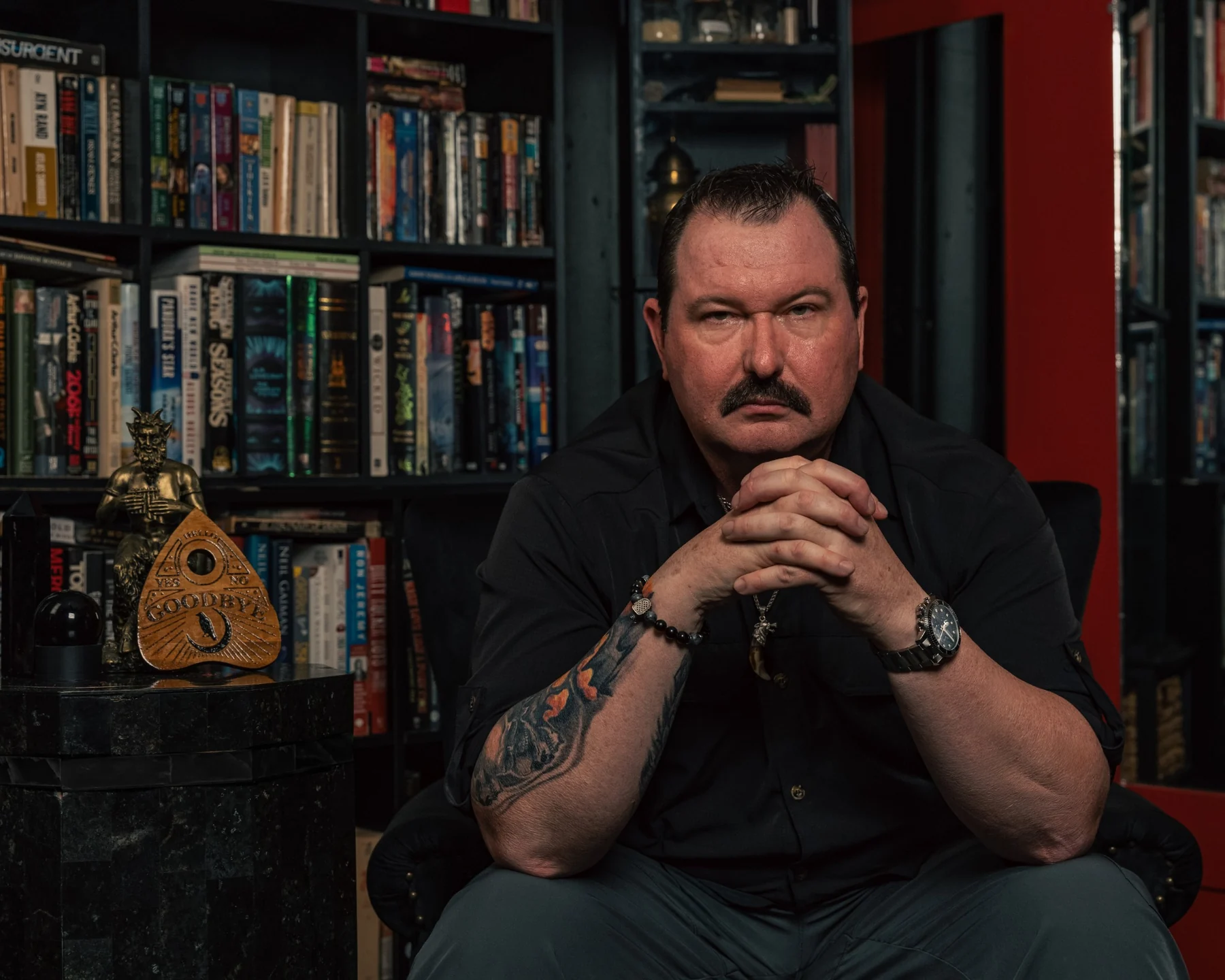 Matthew J. Sorge seated in a cinematic Conjuring Truth portrait